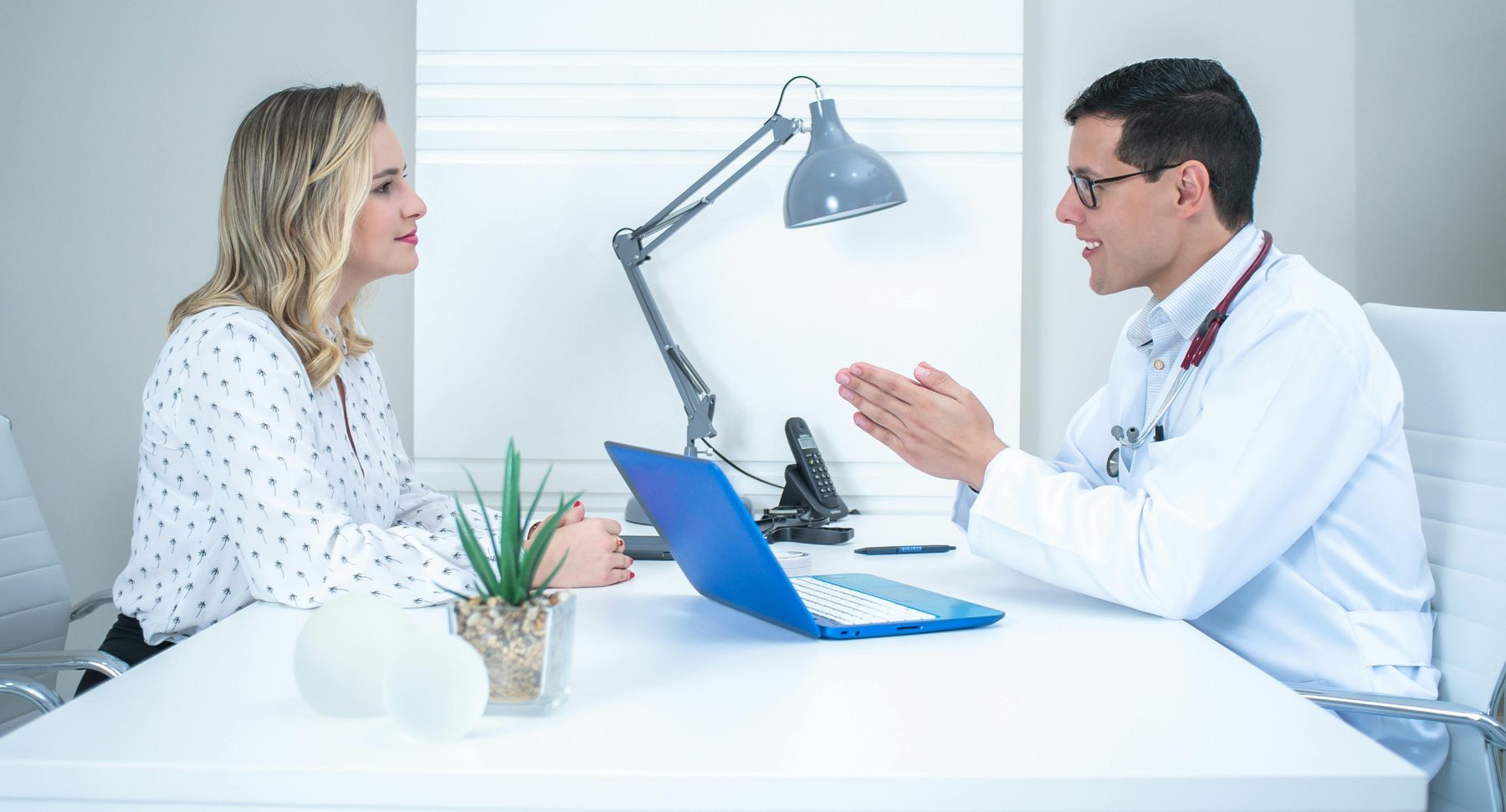 Medical professional consultation in a modern clinical office